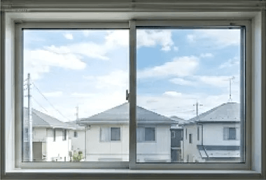 窓から見える住宅街の景色